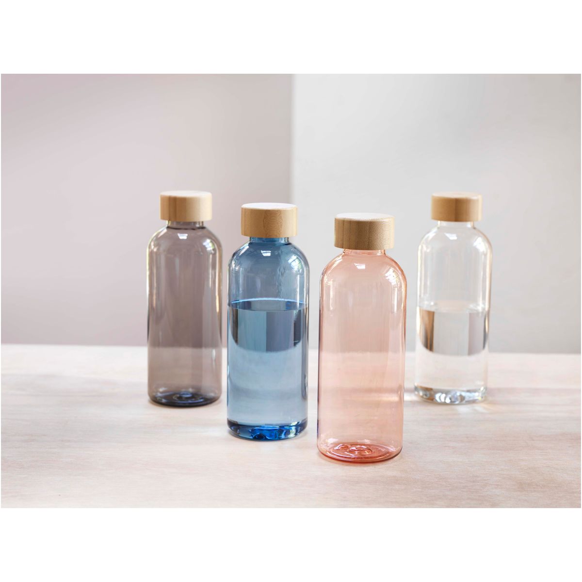 Botellas deportivas de PET reciclado de 650 ml con tapa de bambú